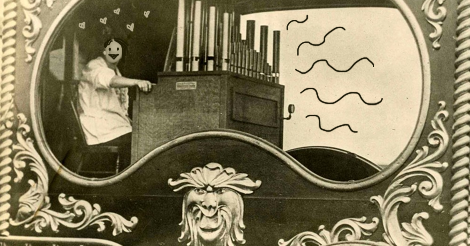 I have taken an old photo from maybe the early 1900s of a woman inside of maybe a circus car? Anyway she is playing the calliope and I have removed her face and drawn in the Amandoll face completely excited and surrounded by heart bubbles.