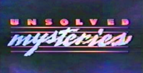 The lo-fi screen capture of the Unsolved Mysteries title screen, in its pink purple and blue glory.